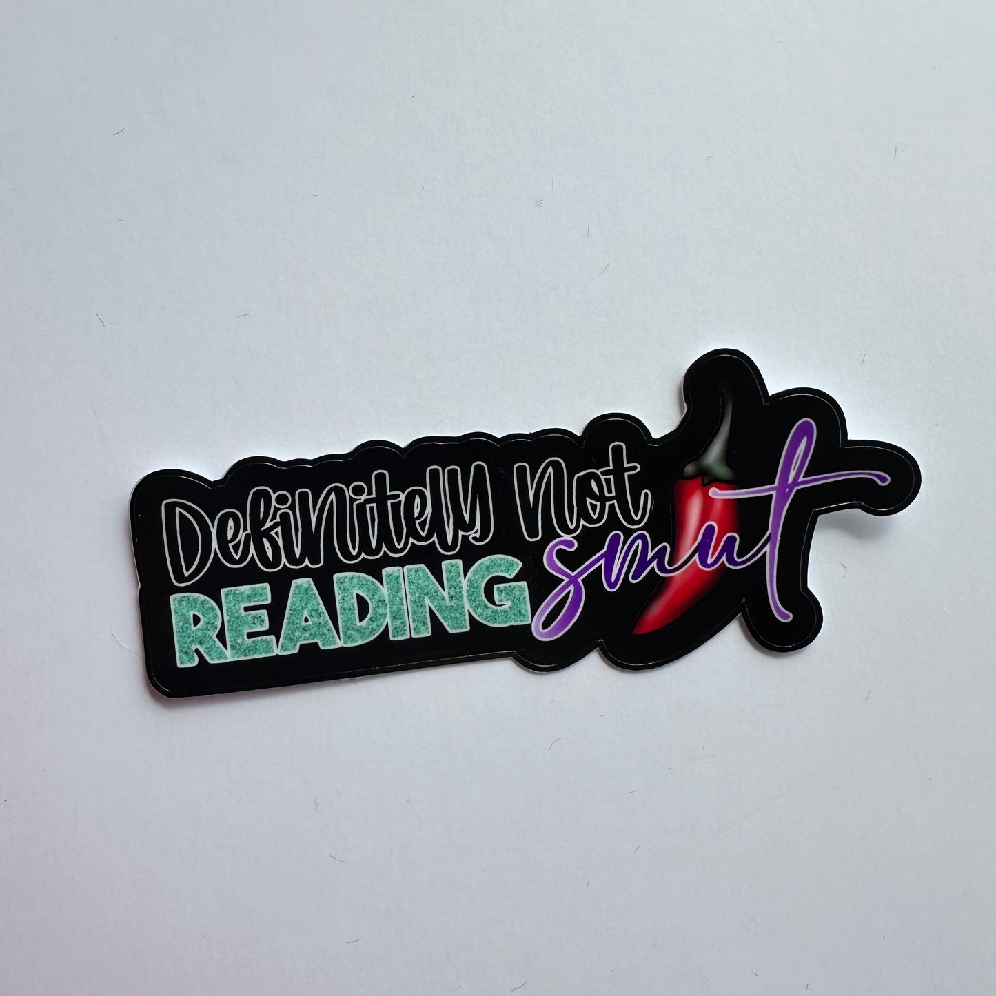 Definitely not reading smut - Water-resistant Vinyl Sticker